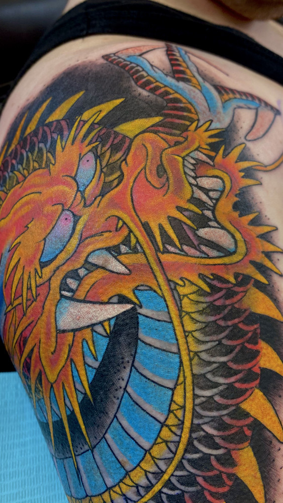 Japanese, Large-Scale Black & Grey, and Fineline Realism tattoo work by Jo at Have Faith Tattoo Bath