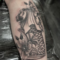 black and grey tattoo by Lottie at Have Faith Tattoo Bath
